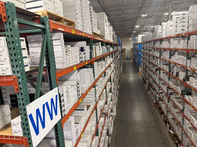 Hughes Supply Phoenix warehouse shelves stocked with Kohler plumbing supplies